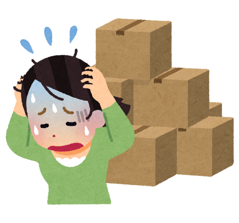 段ボールが多くて困っている女性